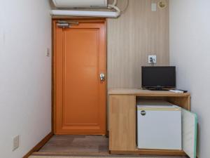 Kuchyň nebo kuchyňský kout v ubytování Business Hotel Kaga