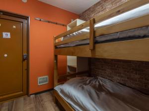 Postel nebo postele na pokoji v ubytování Business Hotel Kaga