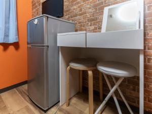 Kuchyň nebo kuchyňský kout v ubytování Business Hotel Kaga