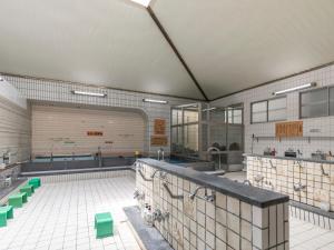 Kuchyň nebo kuchyňský kout v ubytování Business Hotel Kaga