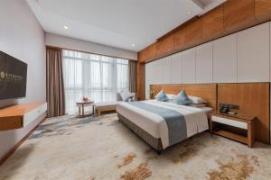 Cama ou camas em um quarto em FLIPORT Hotel Xiamen Software Park