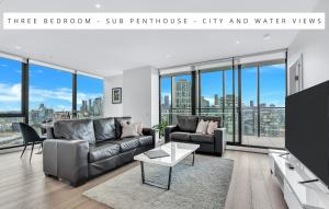 Area soggiorno di Melbourne Lifestyle Apartments - Best Views on Collins