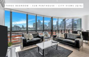Area soggiorno di Melbourne Lifestyle Apartments - Best Views on Collins