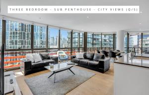 Area soggiorno di Melbourne Lifestyle Apartments - Best Views on Collins