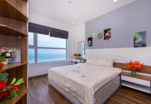 Postel nebo postele na pokoji v ubytování Oasky Apartment in vung tau + 44 fotografií