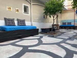 a bed sitting on top of a patio at Efi studios 2 in Kardamaina