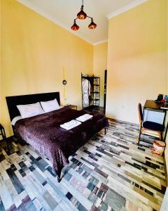 Letto o letti in una camera di Green Flower Hotel
