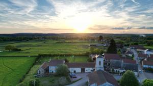 an aerial view of a small village at sunset at Morvan Séjours in Antully