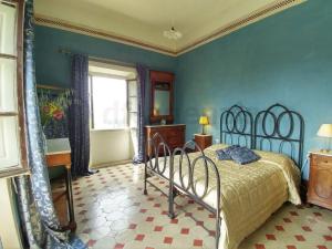 En eller flere senger på et rom på Historic villa near Florence
