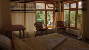 Postel nebo postele na pokoji v ubytování Saichen Lamayuru Guest House