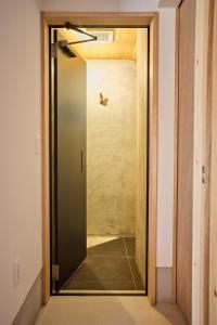 a door leading into a room with a hallway at Villa Amatsuboshi - Vacation STAY 83624v in Tahara