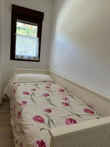 A bed or beds in a room at Apartamento Almanzor