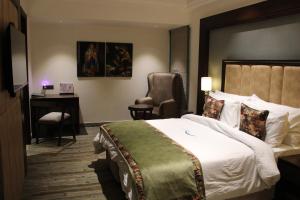 Voodi või voodid majutusasutuse BluSalzz Residence Amritsar toas