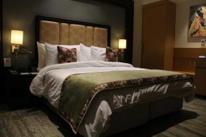 Voodi või voodid majutusasutuse BluSalzz Residence Amritsar toas