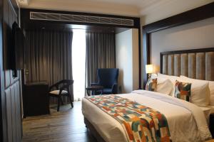 Voodi või voodid majutusasutuse BluSalzz Residence Amritsar toas