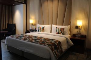 Voodi või voodid majutusasutuse BluSalzz Residence Amritsar toas