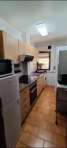 Kuchyň nebo kuchyňský kout v ubytování Apartamento Casalmar