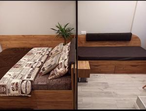 ein Schlafzimmer mit einem Bett mit Kissen darauf in der Unterkunft Amazing Lux Studio Apartment in the Comfort Town KT-07 in Kiew