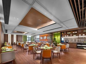 Restorāns vai citas vietas, kur ieturēt maltīti, naktsmītnē Hilton Hotel by Hampton Wuhan Zhongnan Street Branch