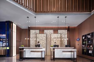 Vestibils vai reģistratūra naktsmītnē Hilton Hotel by Hampton Wuhan Zhongnan Street Branch
