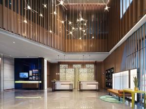 Televizors / izklaižu centrs naktsmītnē Hilton Hotel by Hampton Wuhan Zhongnan Street Branch
