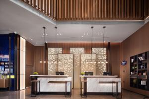Vestibils vai reģistratūra naktsmītnē Hilton Hotel by Hampton Wuhan Zhongnan Street Branch