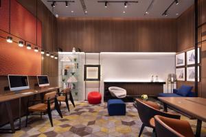 Televizors / izklaižu centrs naktsmītnē Hilton Hotel by Hampton Wuhan Zhongnan Street Branch