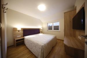 Postel nebo postele na pokoji v ubytování Appartement Central by Schladmingurlaub