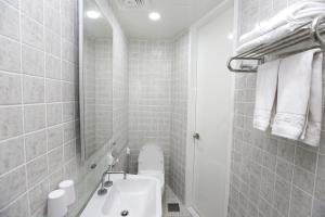 Koupelna v ubytování Hamdeok Beach Stay Jeju