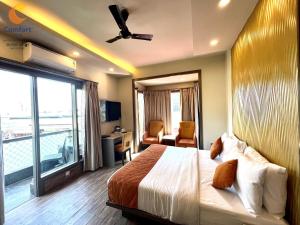 Ένα ή περισσότερα κρεβάτια σε δωμάτιο στο Comfort Inn Silver Arch Hotel, Mussoorie