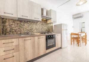 Η κουζίνα ή μικρή κουζίνα στο Residence Elena