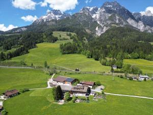 an aerial view of a house in the mountains at Brandstatthof Leogang in Leogang