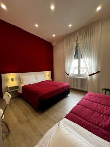 A bed or beds in a room at Quelli del vesuvio