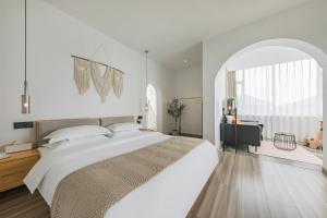 Letto o letti in una camera di 莫干山雅泉山居