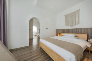 Letto o letti in una camera di 莫干山雅泉山居