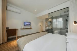 Letto o letti in una camera di 莫干山雅泉山居