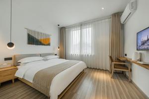 Letto o letti in una camera di 莫干山雅泉山居
