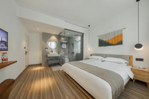Letto o letti in una camera di 莫干山雅泉山居