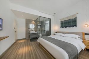 Letto o letti in una camera di 莫干山雅泉山居