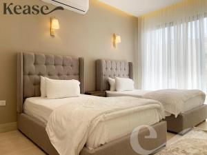 Säng eller sängar i ett rum på Kease Yasmin E-3 Royal touch GX80