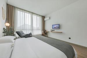 Letto o letti in una camera di 莫干山雅泉山居