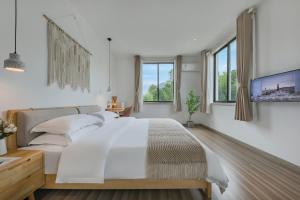 Letto o letti in una camera di 莫干山雅泉山居