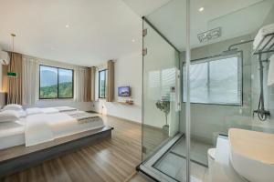 Letto o letti in una camera di 莫干山雅泉山居