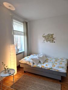 a bedroom with a bed and a window at Landhaus Domaine de Marie in Illingen +42 photos
