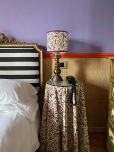 Postel nebo postele na pokoji v ubytování Hotel Hermitage