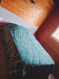 Łóżko lub łóżka w pokoju w obiekcie Chalet idéal 4-8 pers avec garage 20 mn Gérardmer