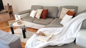Posezení v ubytování Deluxe Apartman Pervan