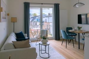 Posezení v ubytování Kapitänshaus Friedrich Franz - Premium Apartments 200 Meter vom Strand und Alten Strom