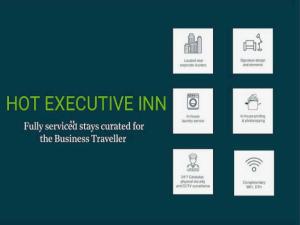 a sign that reads hot executive inn publicly serviced stays enacted for the business traveler at Collection O 93572 HOTEL EXECUTIVE INN in Silchar