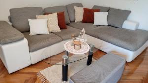 Posezení v ubytování Deluxe Apartman Pervan